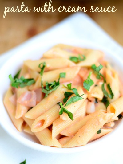 pasta-with-garlic-tomato-cream-sauce-and-basil-comfort-food-italian-recipe |kannammacooks.com #garlic #basil #tomato #pasta #cream #sauce #30-minutes #dinner #easy #recipe #italian